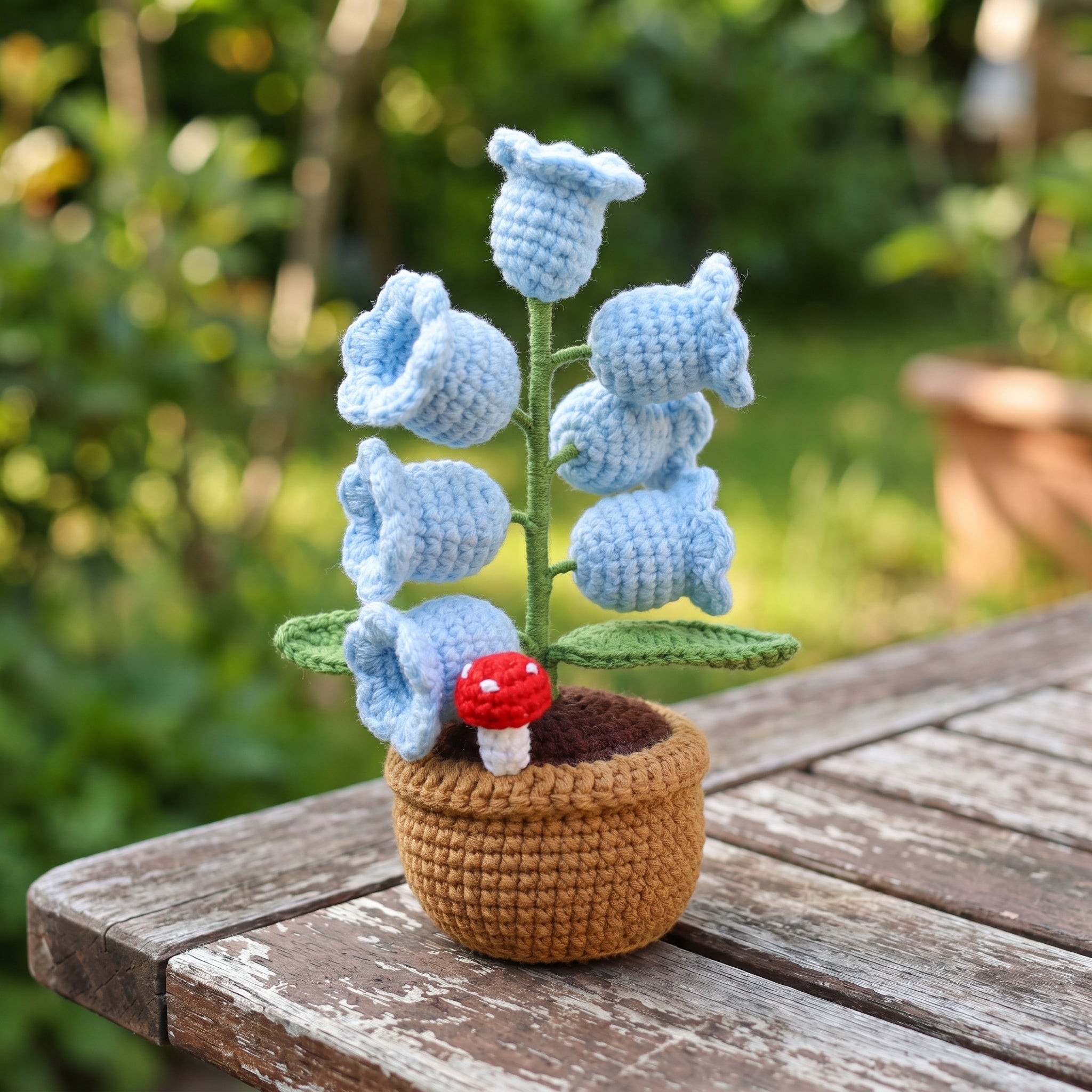 Leuchtende Häkelblume Aurelia Blau